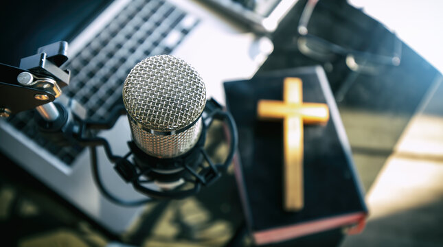 Close up microphone of christian radio broadcast, podcast studio interior. preacher reads the bible online, records a podcast.