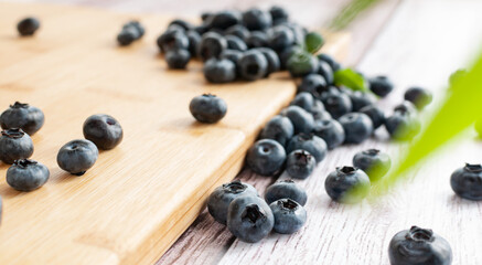 Fresh blueberries scattered on the surface. selective focus