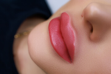 close-up of permanent lip makeup procedure