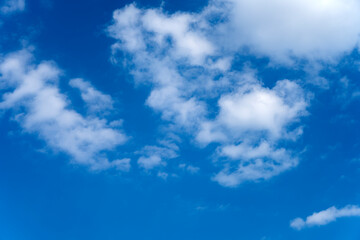 Naklejka na ściany i meble Blue cloudy sky on a clear day