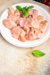 raw chicken pieces slice of poultry meat healthy meal food snack diet on the table copy space food background rustic top view keto or paleo diet