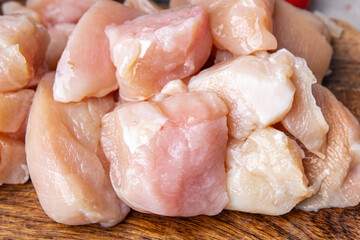 raw chicken pieces slice of poultry meat healthy meal food snack diet on the table copy space food background rustic top view keto or paleo diet