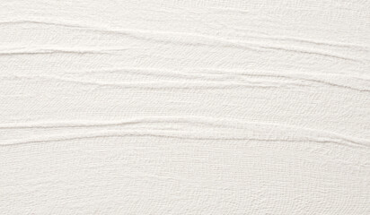 Fototapeta na wymiar Empty crumpled wet canvas fabric blank texture copy space wave background. Gray beige pastel color.