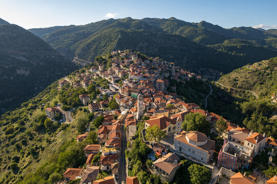 Aerial view of the historical village Dimitsana with the traditional houses and the famous clock tower in Arcadia, Peloponnese, Greece