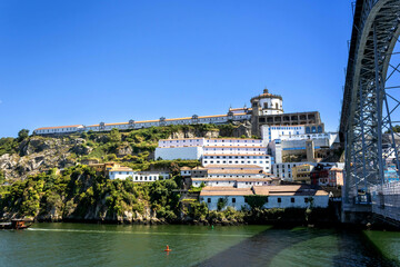 Fototapeta na wymiar Serra do Pilar Monastery and Luis I Bridge, a view from Ribeira, Porto