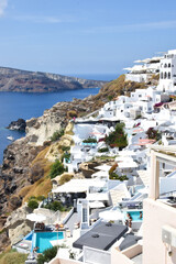 Scenic view of the authentic white houses in the Santorini villages Oia and Thira, on Santorini island, Greece