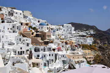 Scenic view of the authentic white houses in the Santorini villages Oia and Thira, on Santorini...