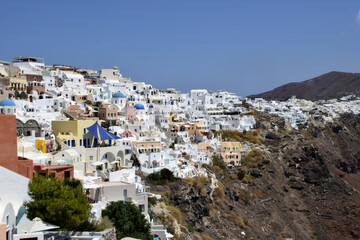 Scenic view of the authentic white houses in the Santorini villages Oia and Thira, on Santorini...