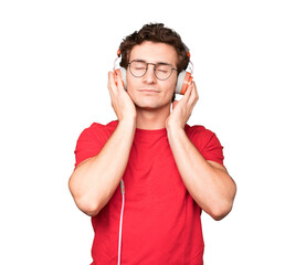 Happy young man using a headphones