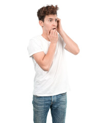 Stressed young guy biting his nails