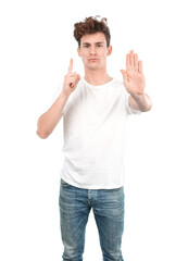 Fototapeta premium Serious young guy with a gesture of stop