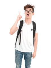 Shocked young student pointing up with his hand