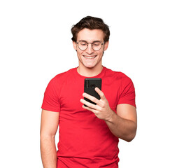 Happy young man using his mobile phone