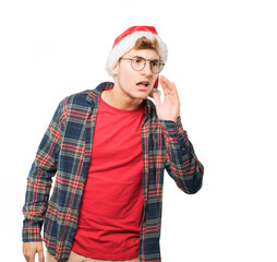 Young man at Christmas doing gestures