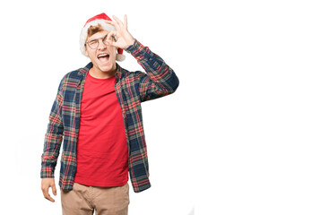 Young man at Christmas doing gestures