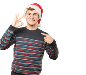 Young man at Christmas doing gestures