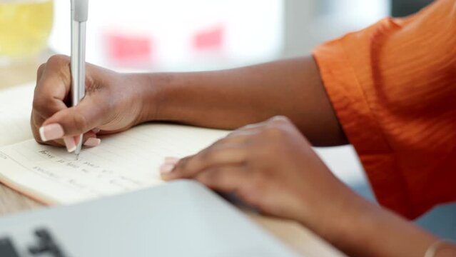 Studying, learning and hands of woman writing notes in a textbook, book or notebook. Education, black girl and student with paper, notepad or books with a pen, pencil and working on assignment.