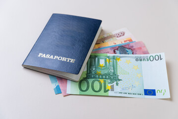 passport with banknotes from different countries, close up
