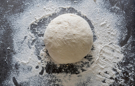 Overhead view of dough on kitchen counter
