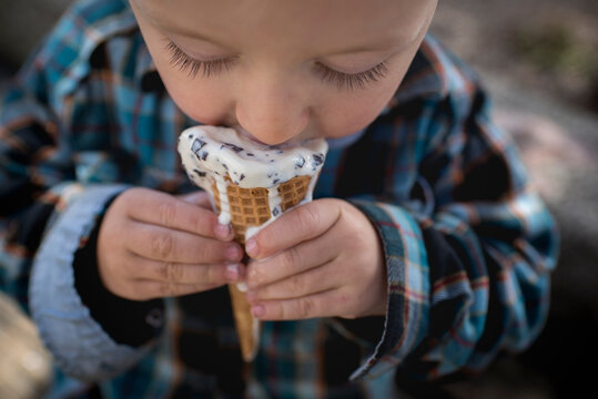 High angle view of boy eating ice cream