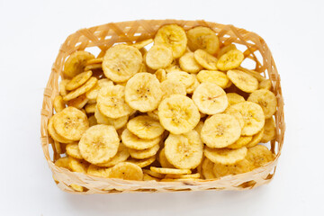 Banana slice chips on white background.