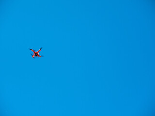 Low angle view of quadcopter flying in clear sky