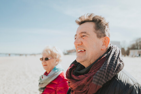 Side view of couple at beach