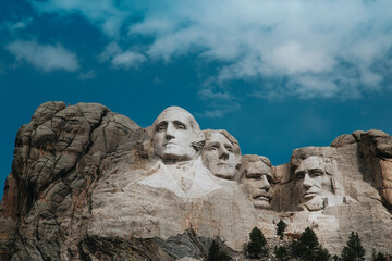 Low angle view of Mt Rushmore National Monument against cloudy sky