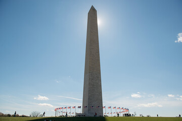 Low angle view of Washington Monument against sky during sunny day