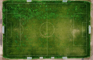 Empty football field aerial view of sports field at ninety degrees angle from drone