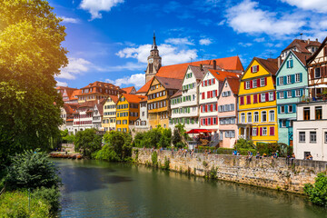 Picturesque town of Tuebingen with colourful half-timbered houses, crossed by the river Neckar. Houses at river Neckar and Hoelderlin tower, Tuebingen, Baden-Wuerttemberg, Germany. Tubingen, Germany.