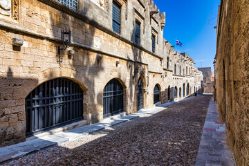 Fototapeta premium The Street of the Knights, the most famous street in Rhodes old town, Rhodes island, Greece. The Street of the Knights in Rhodes is one of the best preserved medieval monuments in the world. Greece