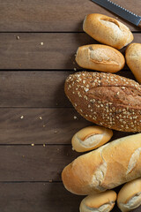 Lot of French Bread Types on a wooden desk