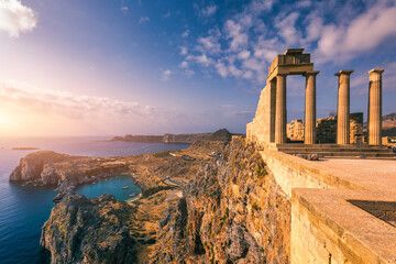 Aerial view on St. Paul's bay in Lindos, Rhodes island, Greece. Panoramic shot overlooking St Pauls Bay at Lindos on the Island of Rhodes, Greece, Europe. - obrazy, fototapety, plakaty