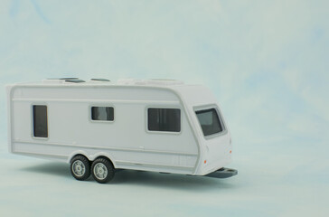Motorhome  camper van trailer toy on ligth background