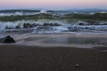 sand and waves on the sea