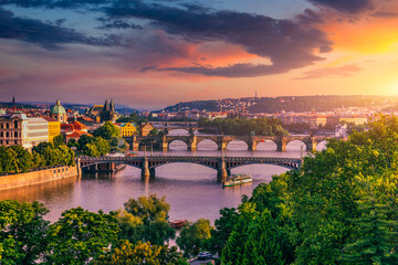Charles Bridge sunset view of the Old Town pier architecture, Charles Bridge over Vltava river in...