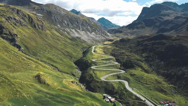road transportation technology, mobility concept of traffic through the swiss alps, julierpass pass street, shot with drone