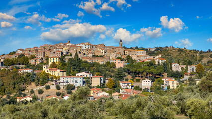 Fototapeta premium Panoramic view of Seggiano, in Tuscany. Seggiano is a small hilltop village located between the hills of Monte Amiata and the wonderful landscape of the Val d'Orcia, Seggiano, Tuscany, Italy.