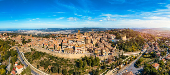 Tuscany, Volterra town skyline, church and panorama view. Maremma, Italy, Europe. Panoramic view of Volterra, medieval Tuscan town with old houses, towers and churches, Volterra, Tuscany, Italy. - obrazy, fototapety, plakaty