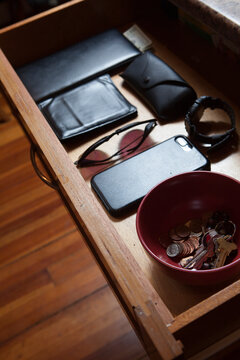High angle view of personal accessories in drawer at home