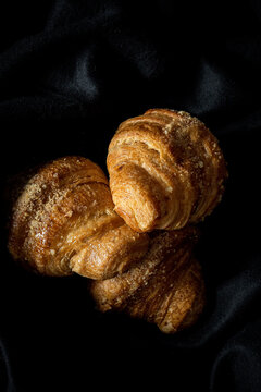 High angle view of croissants on fabric