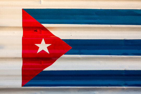 Cuban flag on iron surface