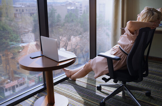 Freelance woman resting on the office chair