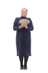 Senior woman pensioner holding money dollar bills in hand isolated white background. Positive emotion facial expression feeling