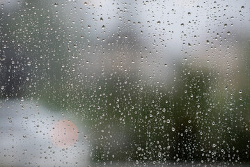 water on mirror, rainy day, abstract background