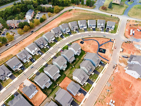 Construction Site With New Houses And Prepared Place For Construction.