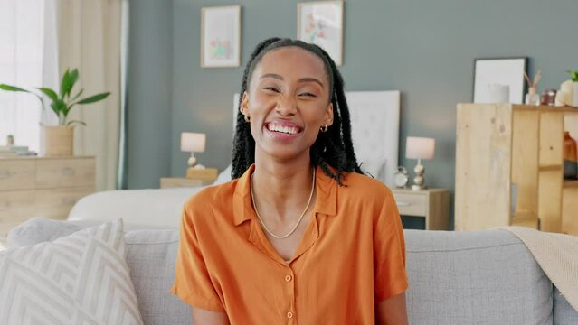 Happy black woman, portrait in home apartment and silly face relaxing in living room. Comedy humor show on couch, goofy laugh at funny meme joke and smile of young african girl with happiness