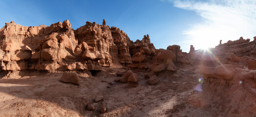 Red Rock Formations in Desert at Sunny Sunrise. Spring Season. Goblin Valley State Park. Utah, United States. Nature Background Panorama
