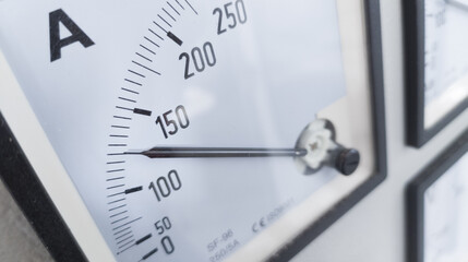 Industrial electric meter scale needle, electric current measuring instrument, for industrial electricity background.